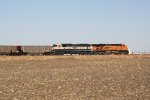 BNSF 9823 & 6081 serve as rear DPUs on a westbound coal empty train